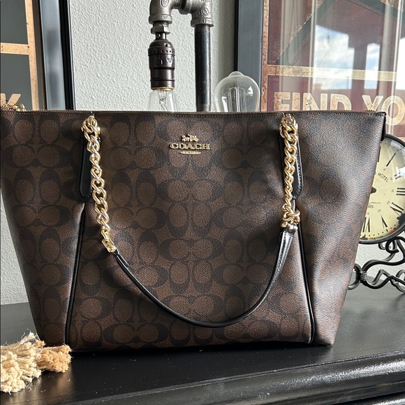 Coach Dark Brown and Black Signature Tote with Gold Chain Accents - Picture 1 of 10